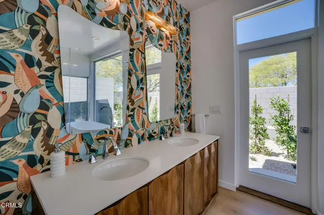 a view of a terrace with a table and chairs