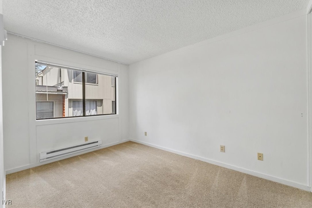 989 Tahoe Boulevard, Unit 20 Incline Village, NV 89451 - Photo 15 of 34 an empty room with windows