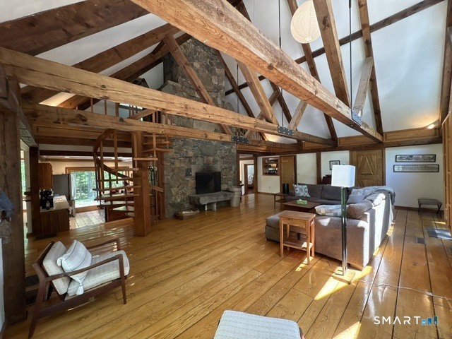40 Looking Glass Hill Road Litchfield, CT 06750 - Photo 32 of 33 a living room with furniture and a wooden floor