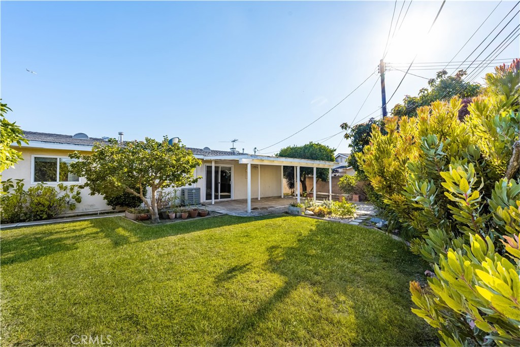 3288 Arizona Lane Costa Mesa, CA 92626 - Photo 19 of 33 a front view of house with yard and outdoor seating