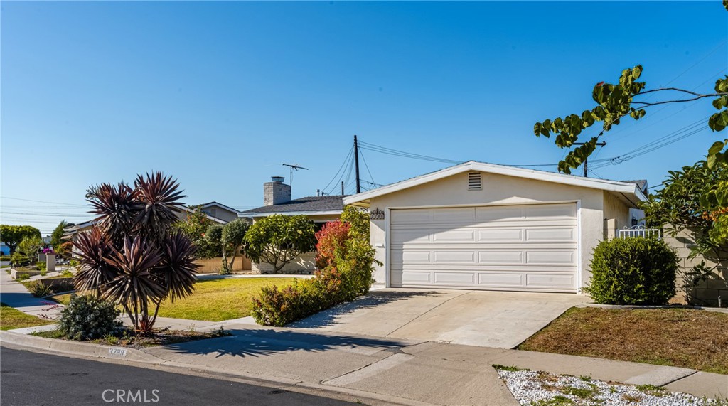 3288 Arizona Lane Costa Mesa, CA 92626 - Photo 2 of 33 a view of a house with a yard and potted plants