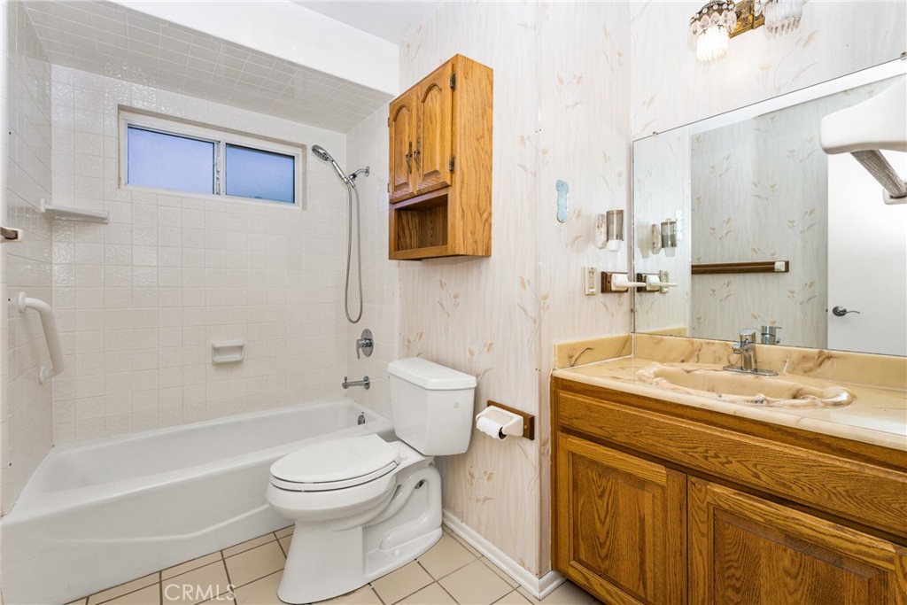 3288 Arizona Lane Costa Mesa, CA 92626 - Photo 21 of 33 a bathroom with a sink a toilet and shower