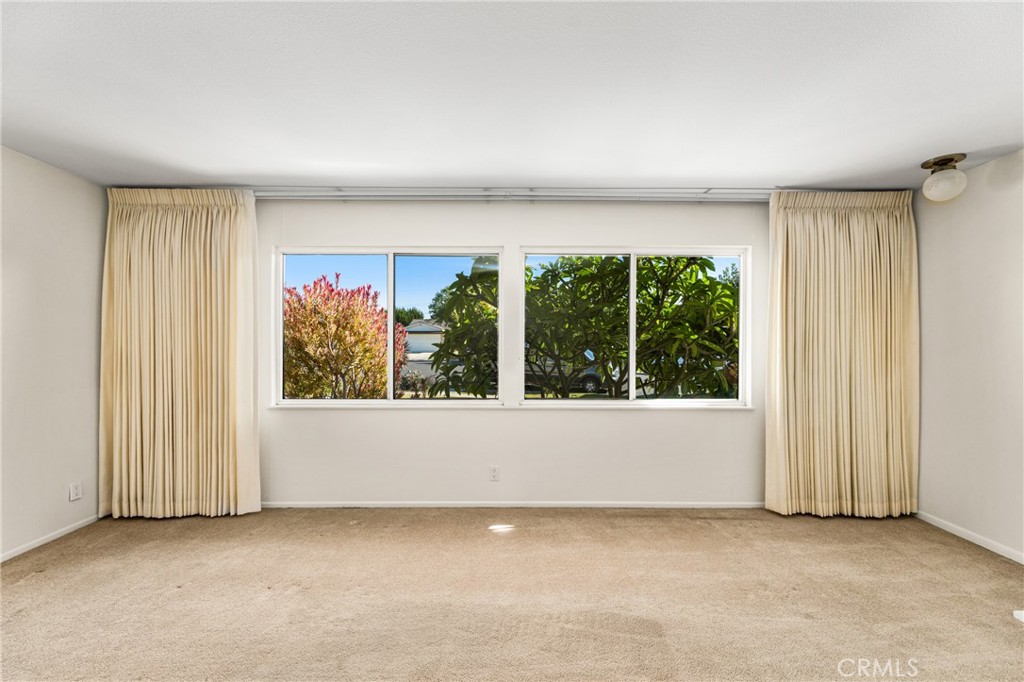 3288 Arizona Lane Costa Mesa, CA 92626 - Photo 7 of 33 an empty room with windows