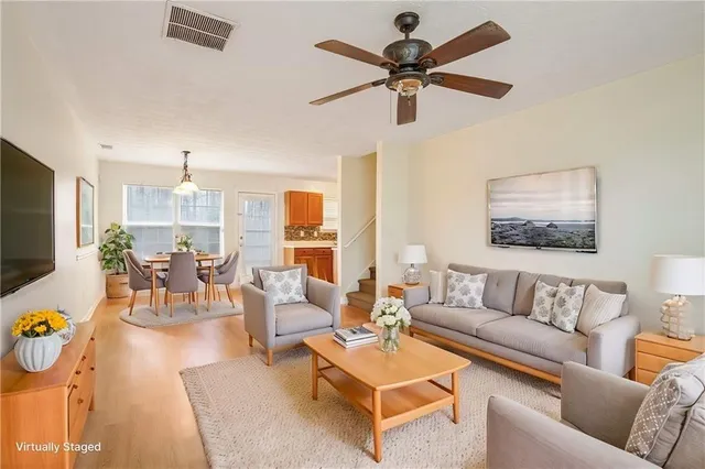 a workspace with furniture and a book shelf