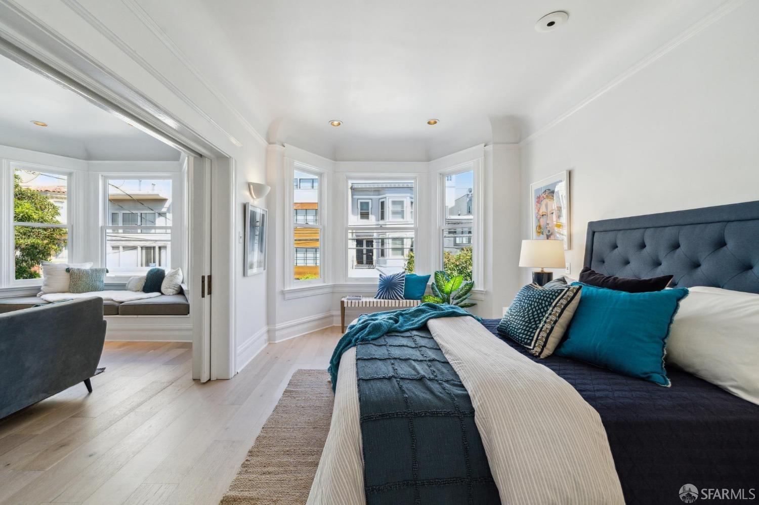 2421 Larkin Street San Francisco, CA 94109 - Photo 19 of 29 a living room with furniture and a couch