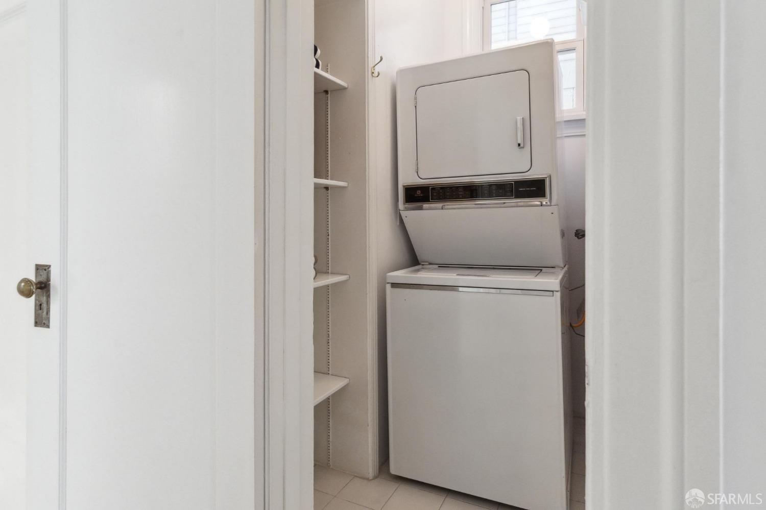 2421 Larkin Street San Francisco, CA 94109 - Photo 25 of 29 a utility room with dryer and washer