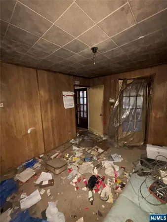 a view of a porch with a wooden floor