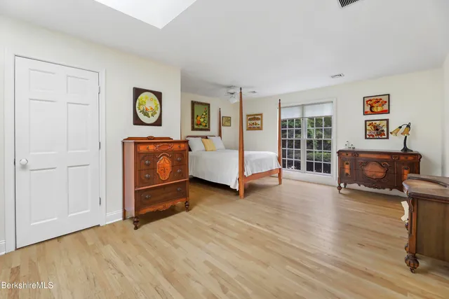 a balcony with furniture and a window