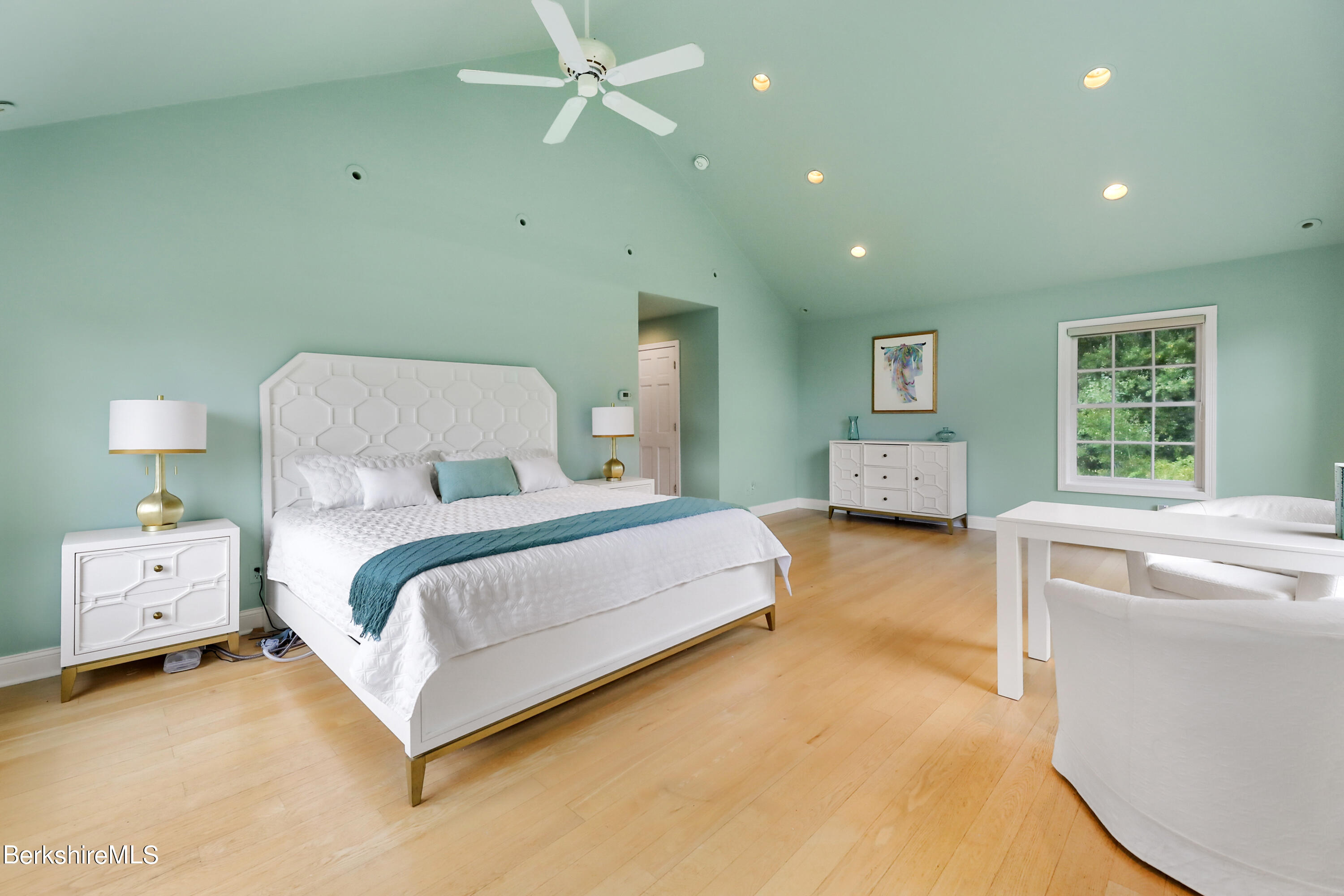 248 E Road Alford, MA 01266 - Photo 26 of 43 a bedroom with a bed and a chandelier