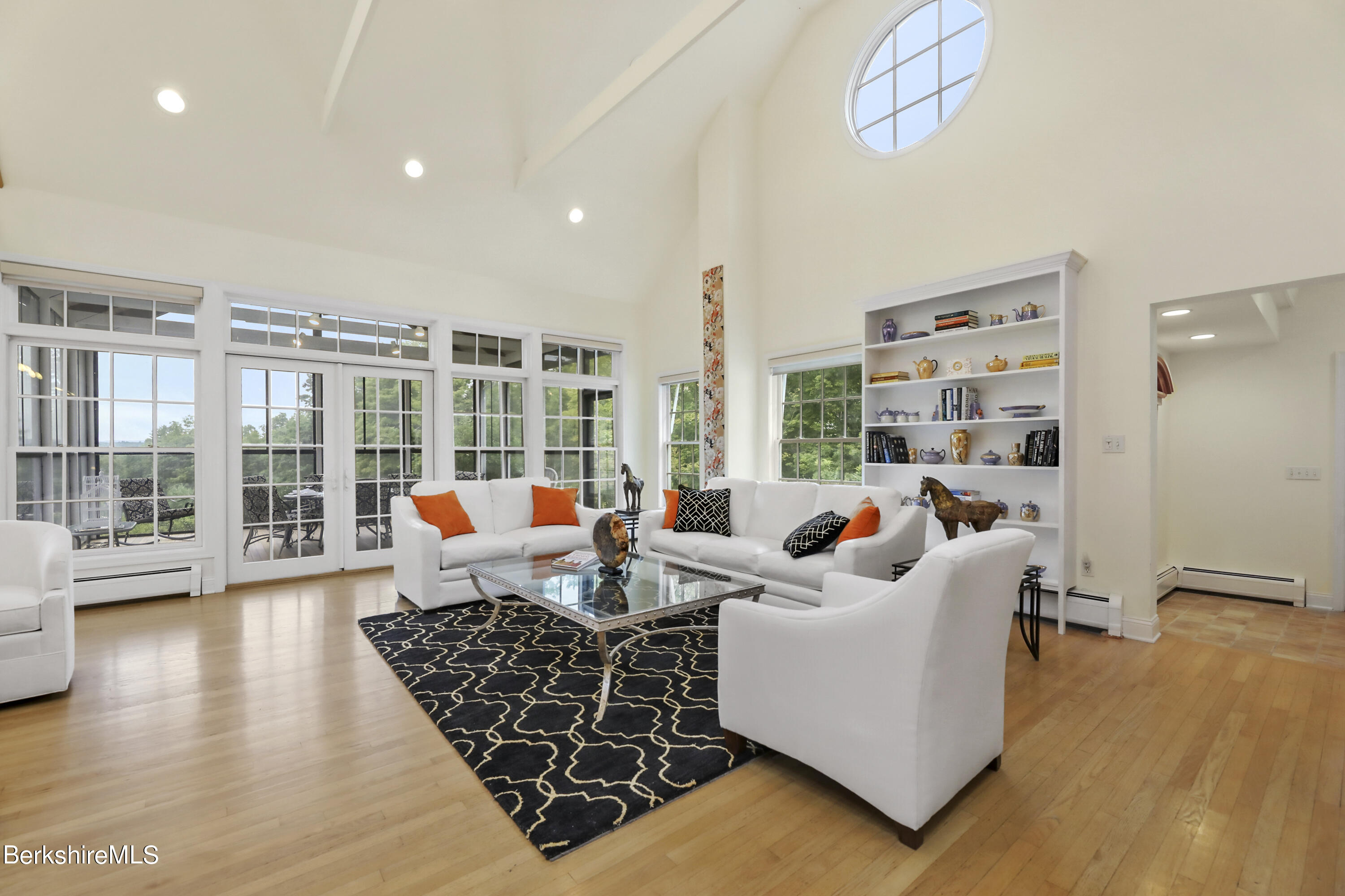 248 E Road Alford, MA 01266 - Photo 6 of 43 a living room with furniture floor to ceiling window and wooden floor