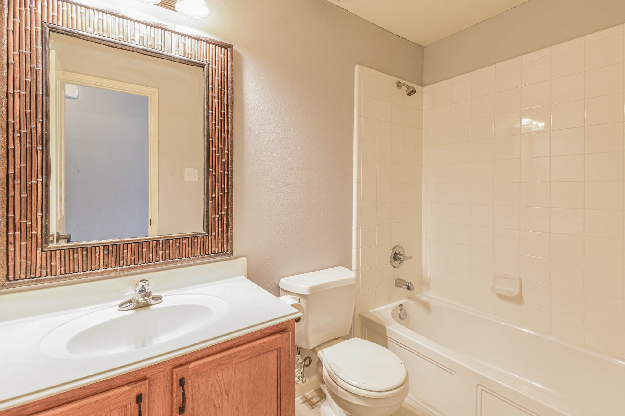 8203 Nagy Hill Street Spring, TX 77379 - Photo 18 of 21 a bathroom with a sink a toilet and shower