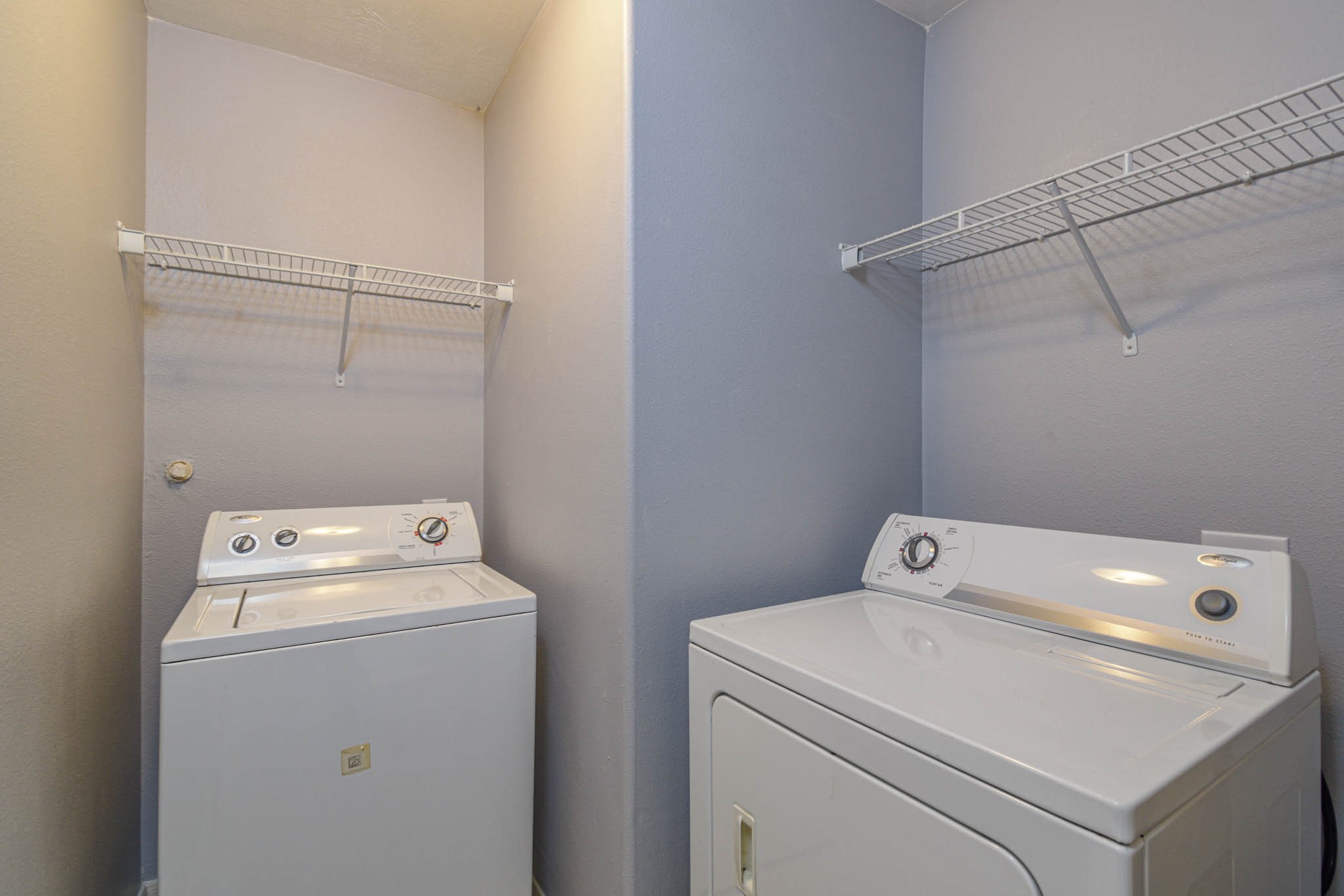 8203 Nagy Hill Street Spring, TX 77379 - Photo 19 of 21 a utility room with dryer and washer