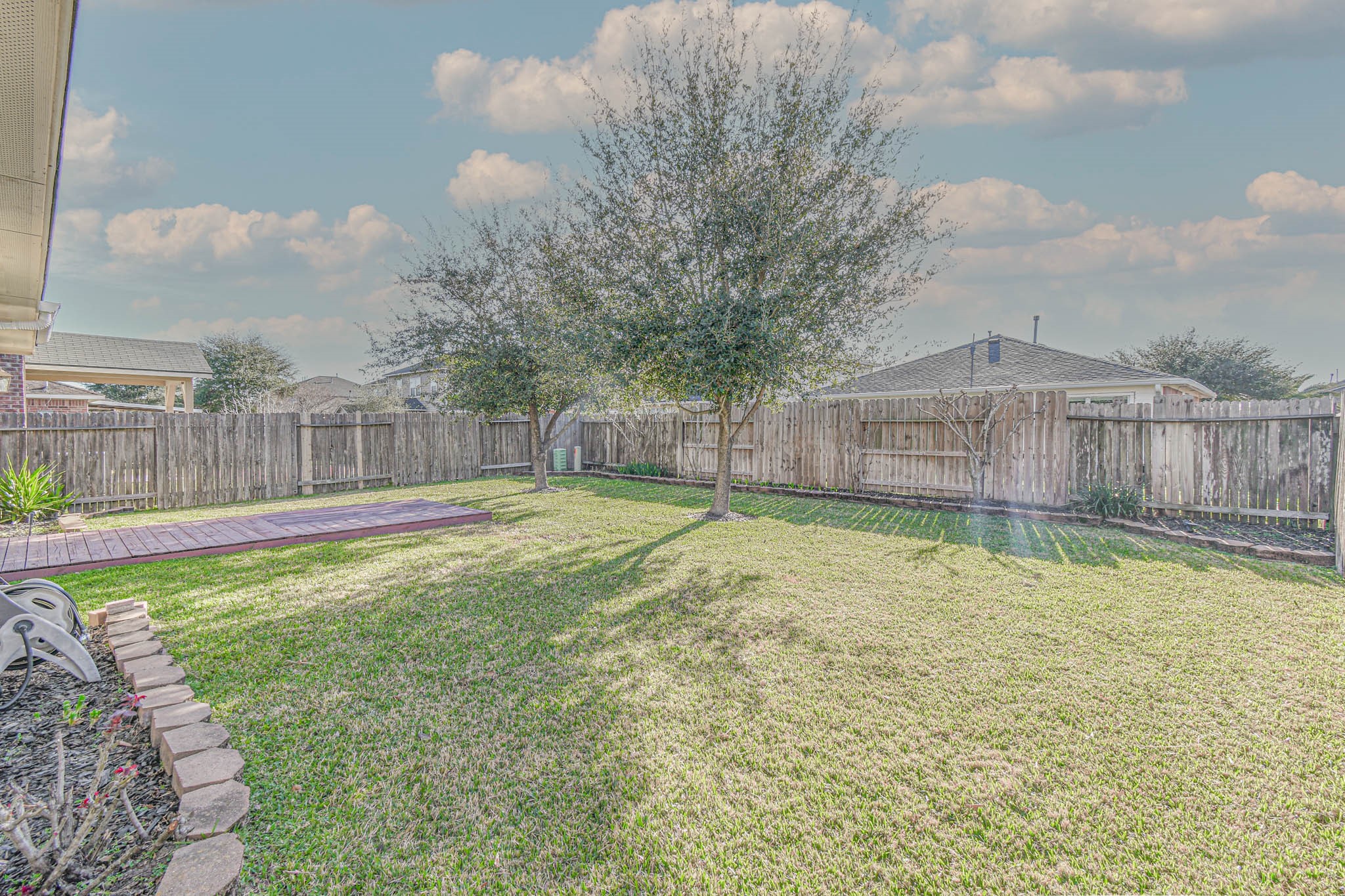 8203 Nagy Hill Street Spring, TX 77379 - Photo 21 of 21 a view of a swimming pool with a yard