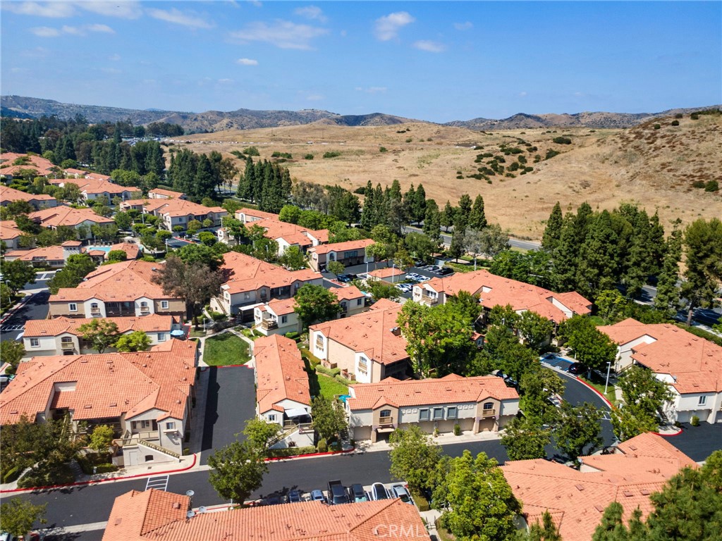 215 South Cross Creek Road, Unit L Orange, CA 92869 - Photo 40 of 50 an aerial view of residential houses with outdoor space