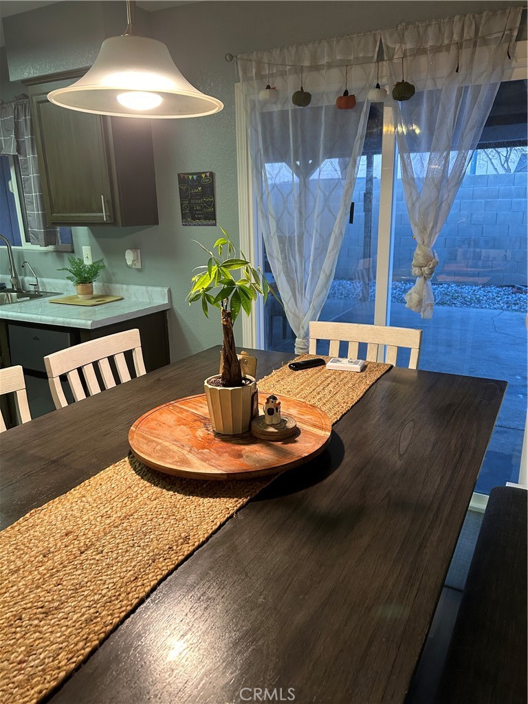 515 Monique Street Merced, CA 95341 - Photo 13 of 22 a dining table with a rug