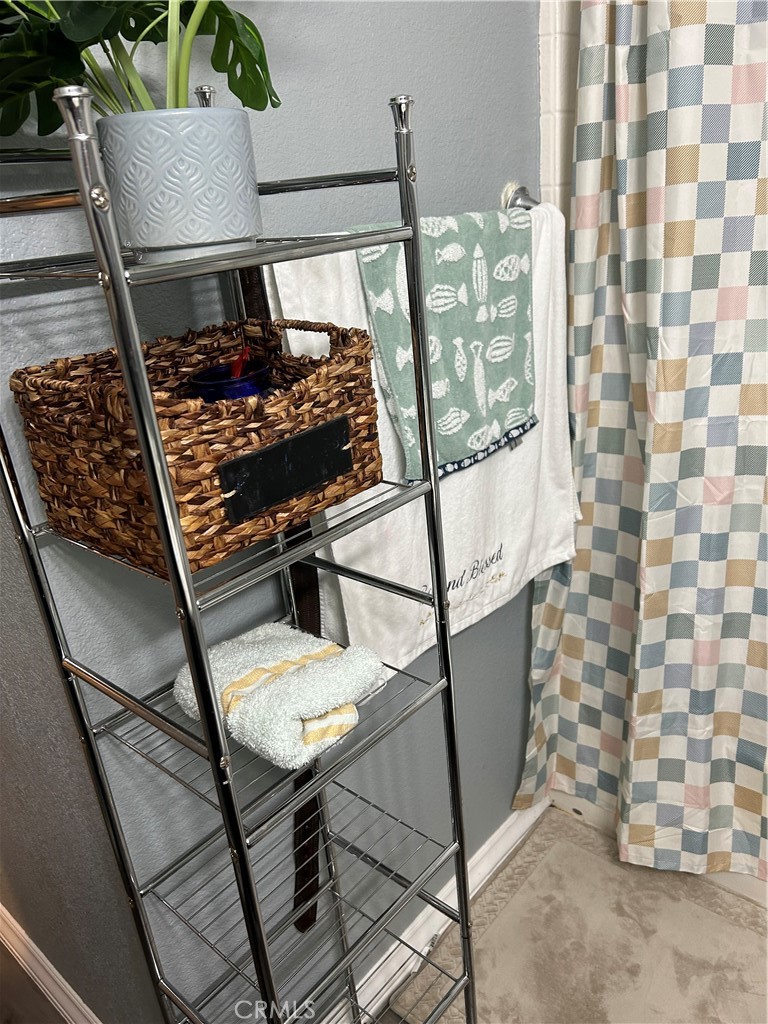 515 Monique Street Merced, CA 95341 - Photo 8 of 22 a room with lots of potted plants