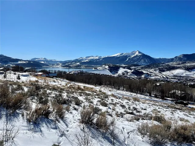 a view of a lake with mountains in the background