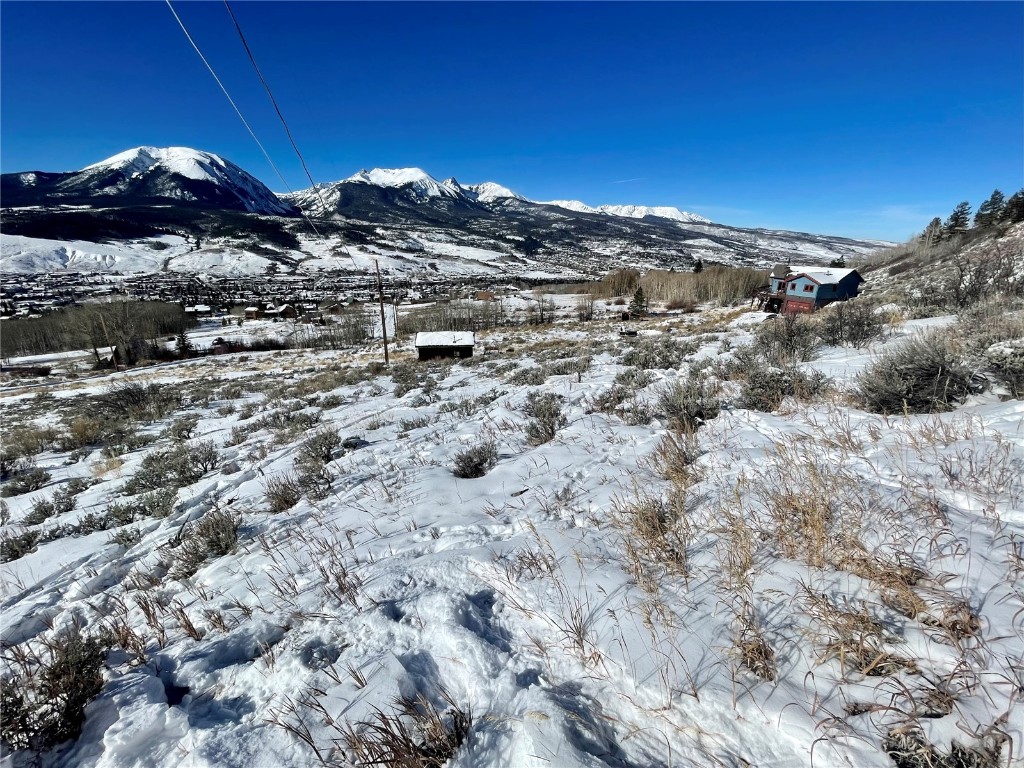 371 Z Road Silverthorne, CO 80498 - Photo 20 of 35 a view of a large building with mountains in the background