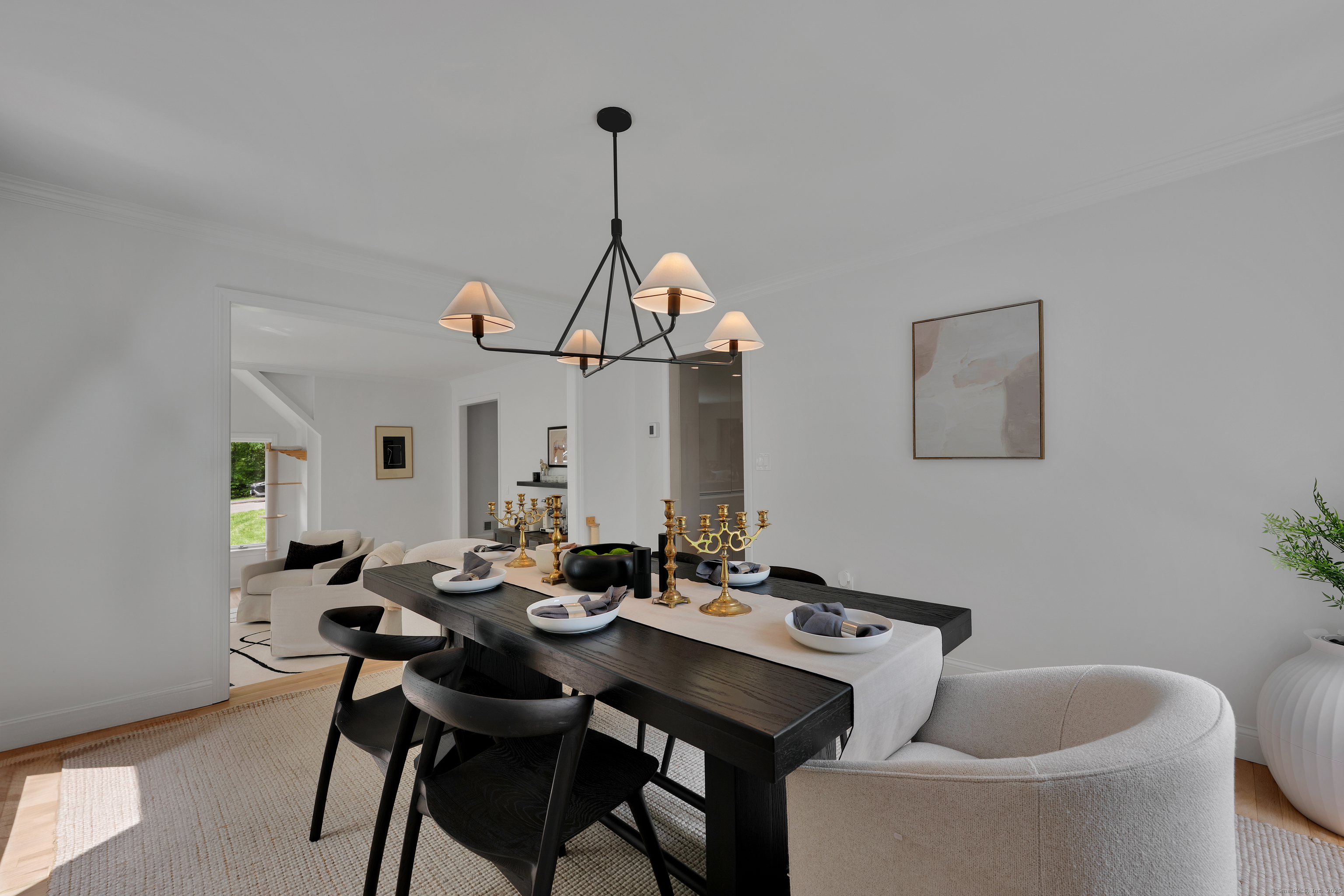 60 Wildcat Road Burlington, CT 06013 - Photo 11 of 39 a view of a dining room with furniture and chandelier