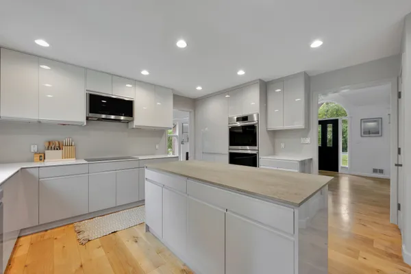 a bed room with furniture and a fireplace