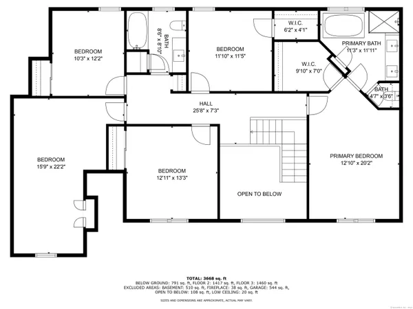 an empty room with wooden floor windows and a ceiling fan