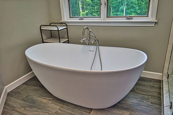 a bathroom with a mirror and a sink