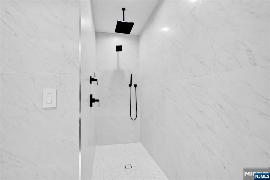 7 Adelaide Place Edgewater, NJ 07020 - Photo 21 of 24 a bathroom with a shower