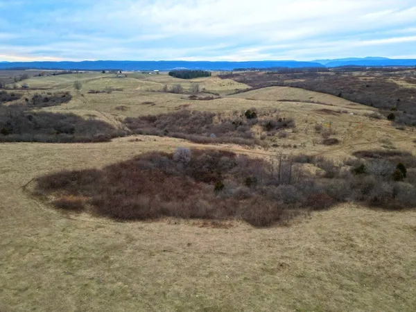 a view of ocean and mountain