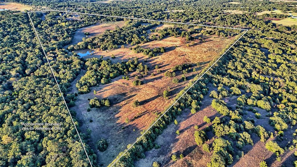 3458 Catholic Cemetery Road Montague, TX 76251 - Photo 31 of 32 an aerial view of house with yard