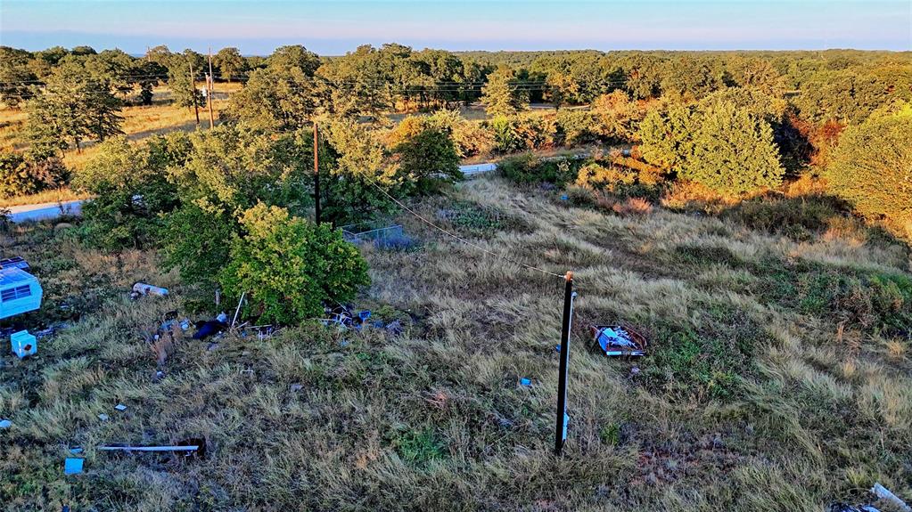 3458 Catholic Cemetery Road Montague, TX 76251 - Photo 5 of 32 a view of a street with a building in the background