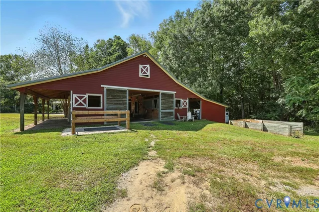 an outdoor view of a house with porch