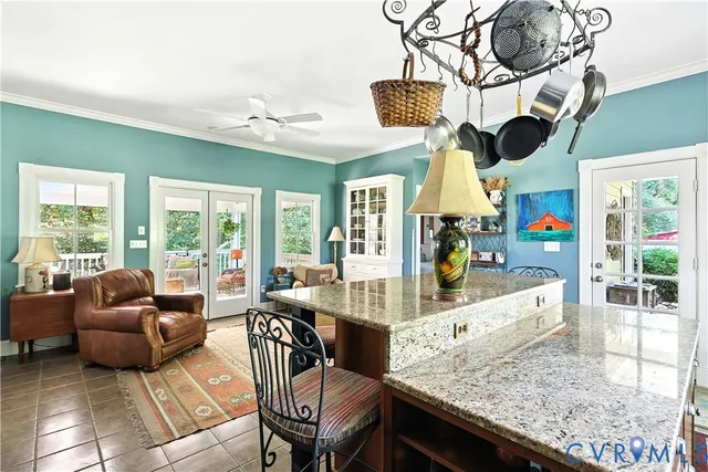 a dining room with furniture window and wooden floor