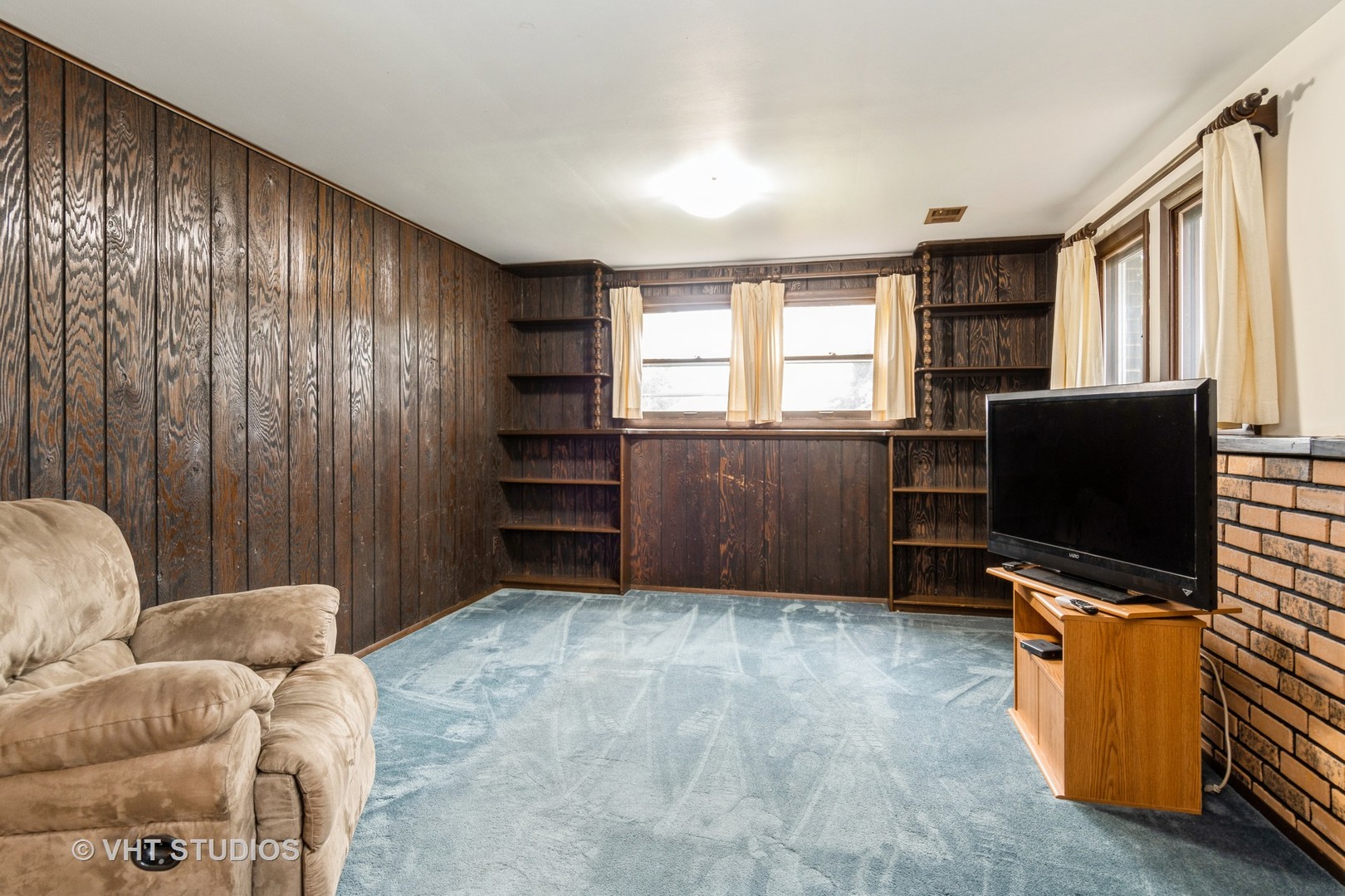 360 Galahad Road Bolingbrook, IL 60440 - Photo 9 of 20 a living room with furniture and a flat screen tv