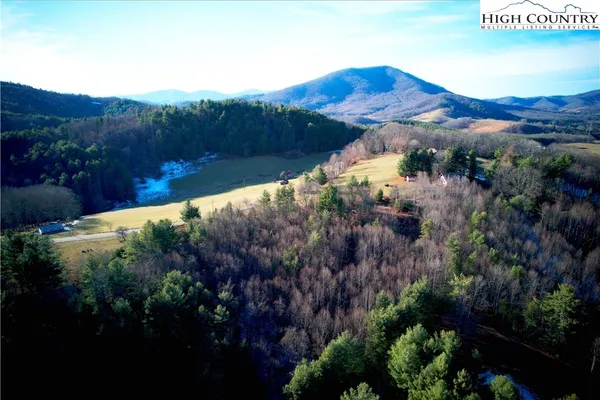 a view of a house with a street