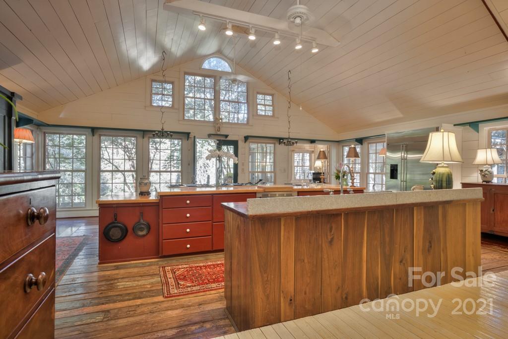 315 North Campbell Road Landrum, SC 29356 - Photo 12 of 40 a kitchen with a sink and wooden cabinets
