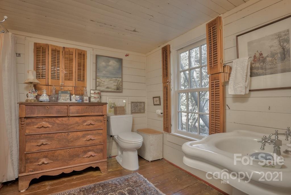 315 North Campbell Road Landrum, SC 29356 - Photo 25 of 40 a spacious bathroom with a toilet a sink and a shower