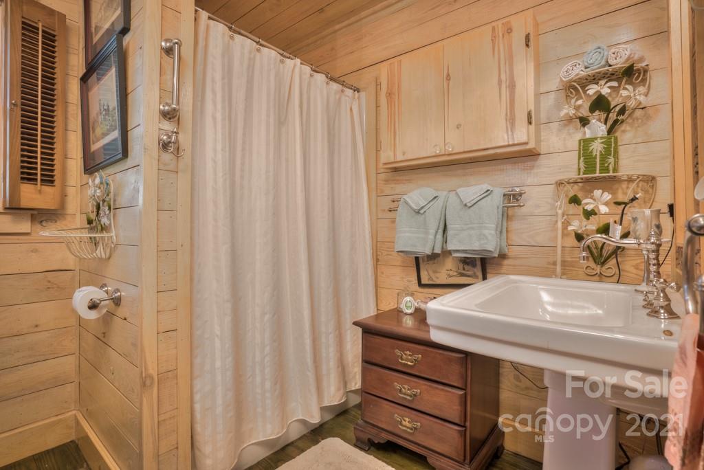 315 North Campbell Road Landrum, SC 29356 - Photo 34 of 40 a bathroom with a sink and a mirror