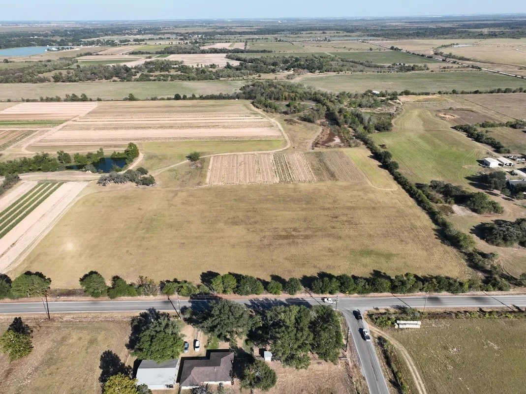 an aerial view of beach and ocean