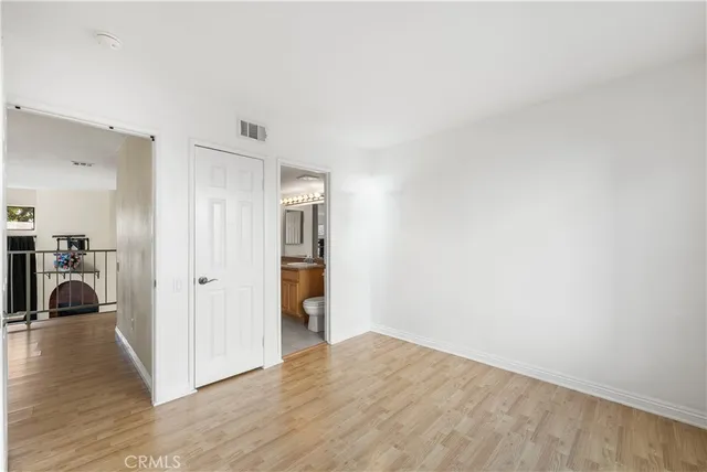 a view of a livingroom and a hallway