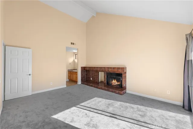 a living room with a fireplace