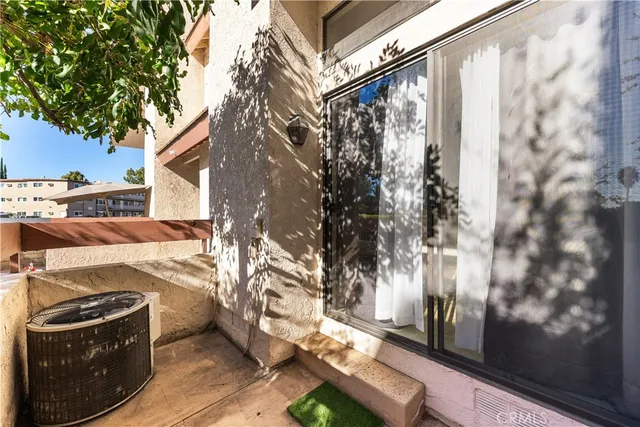 a view of a balcony with staircase