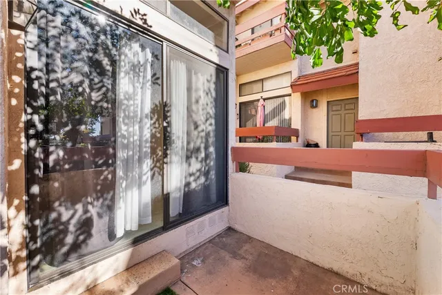 a view of a swimming pool with a terrace