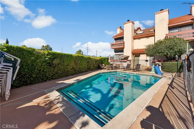 a view of a wooden house with a outdoor space