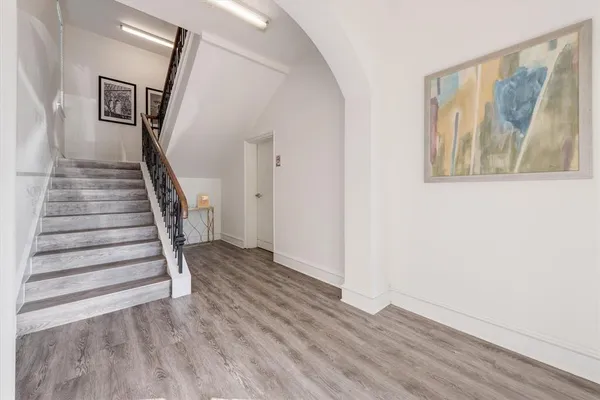 a view of entryway with wooden floor