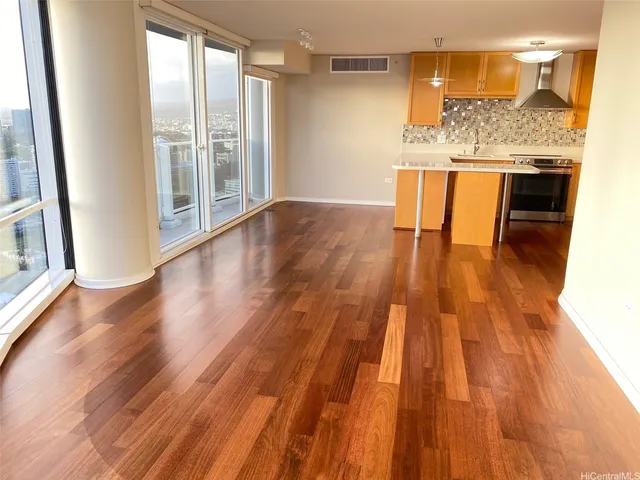 a view of kitchen with wooden floor