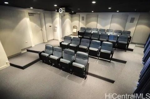 a room with lots of chairs and mirrors