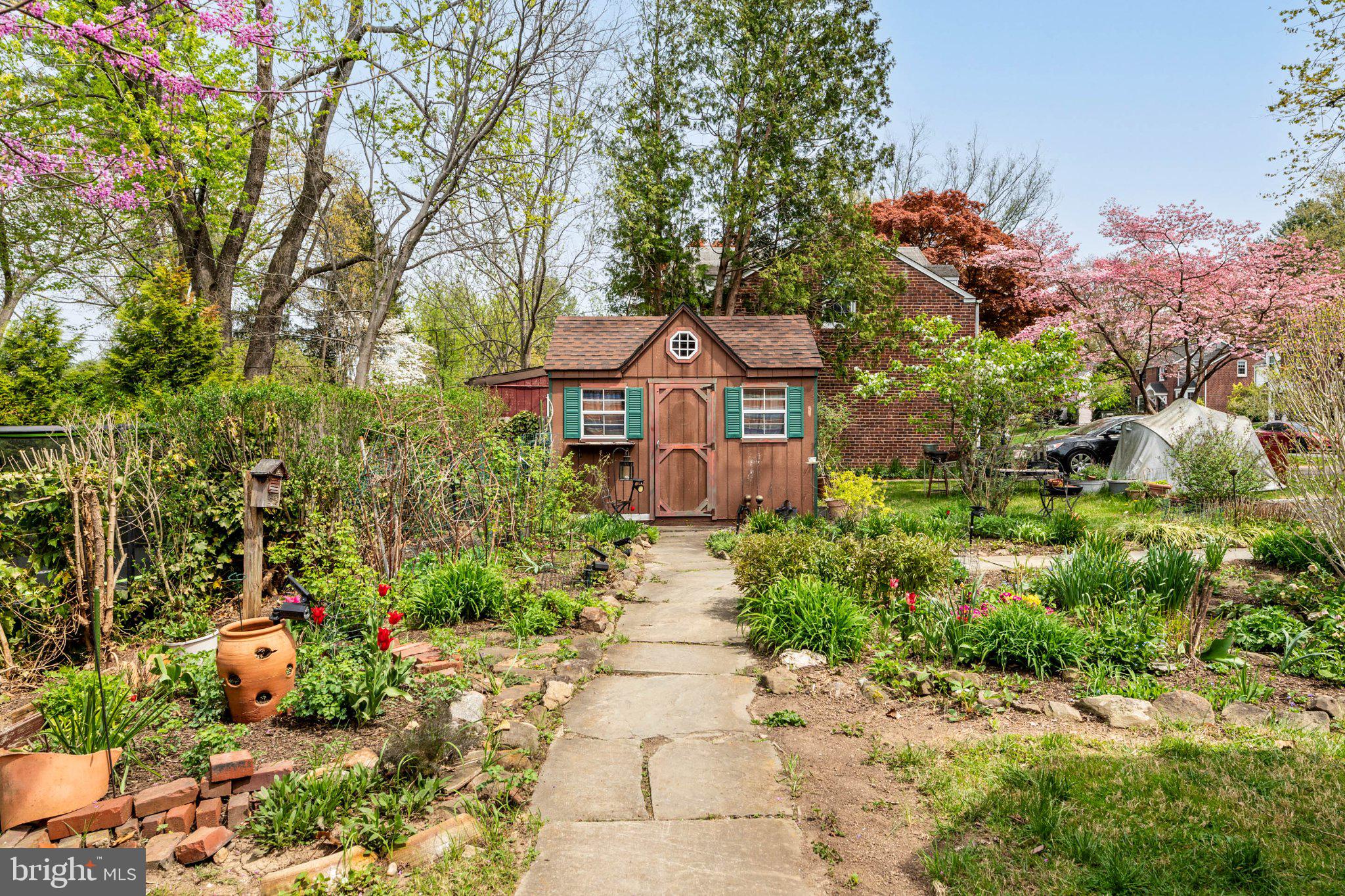 201 Glendalough Road Erdenheim, PA 19038 - Photo 34 of 50 Charming garden path to a quaint shed.