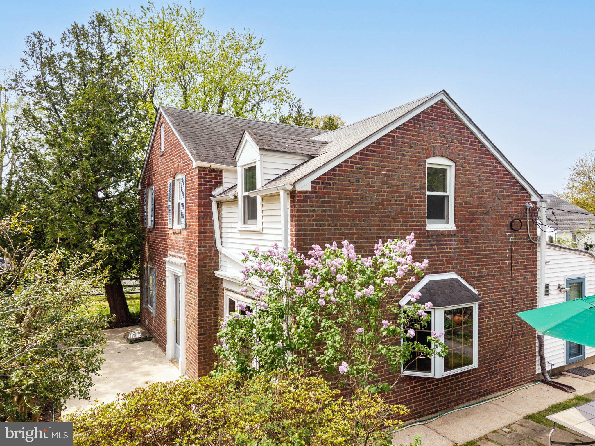 201 Glendalough Road Erdenheim, PA 19038 - Photo 39 of 50 Charming brick home with lush greenery.
