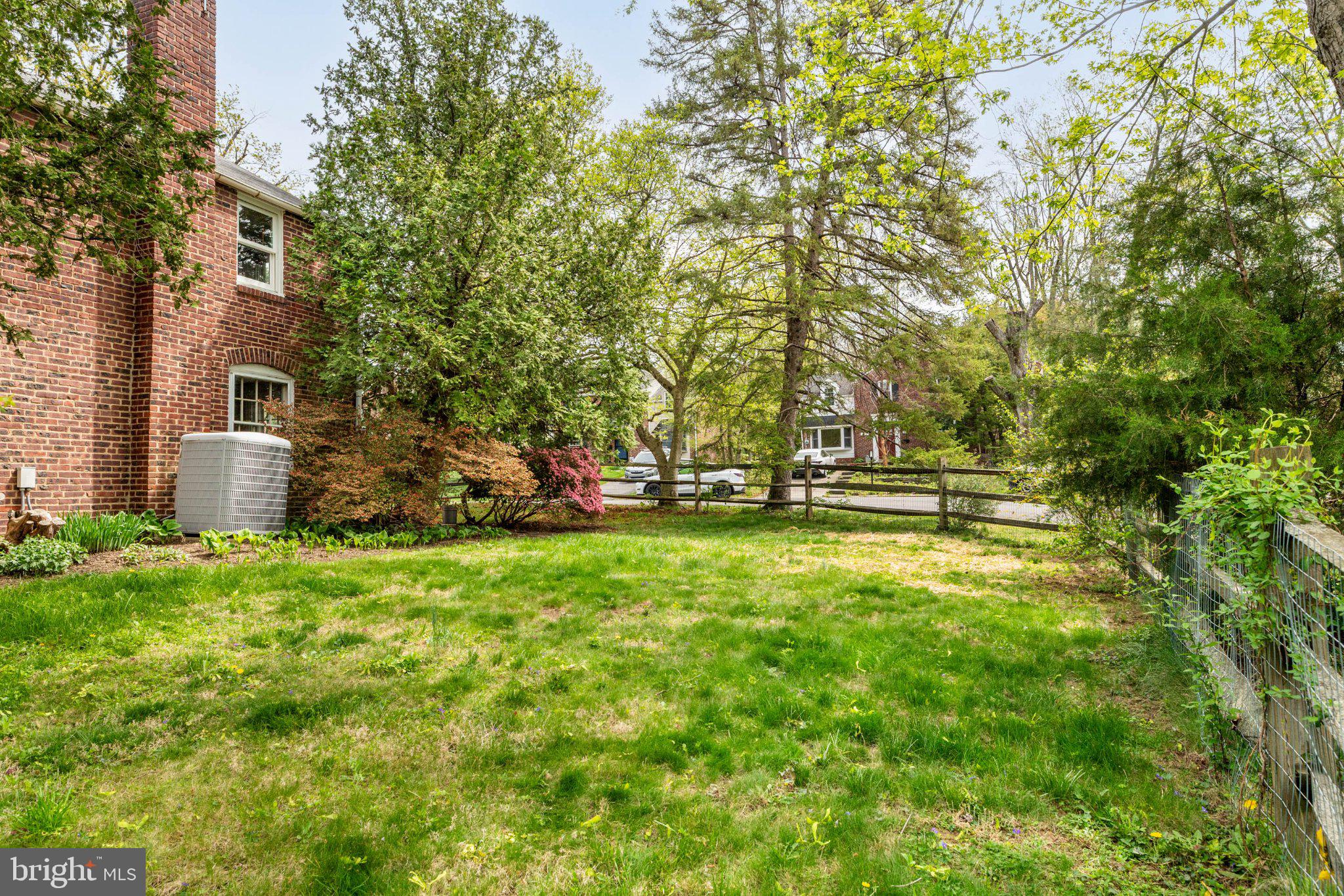 201 Glendalough Road Erdenheim, PA 19038 - Photo 44 of 50 Lush green yard with serene surroundings.