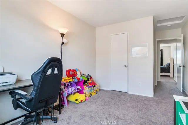 a room with toys and a wooden floor